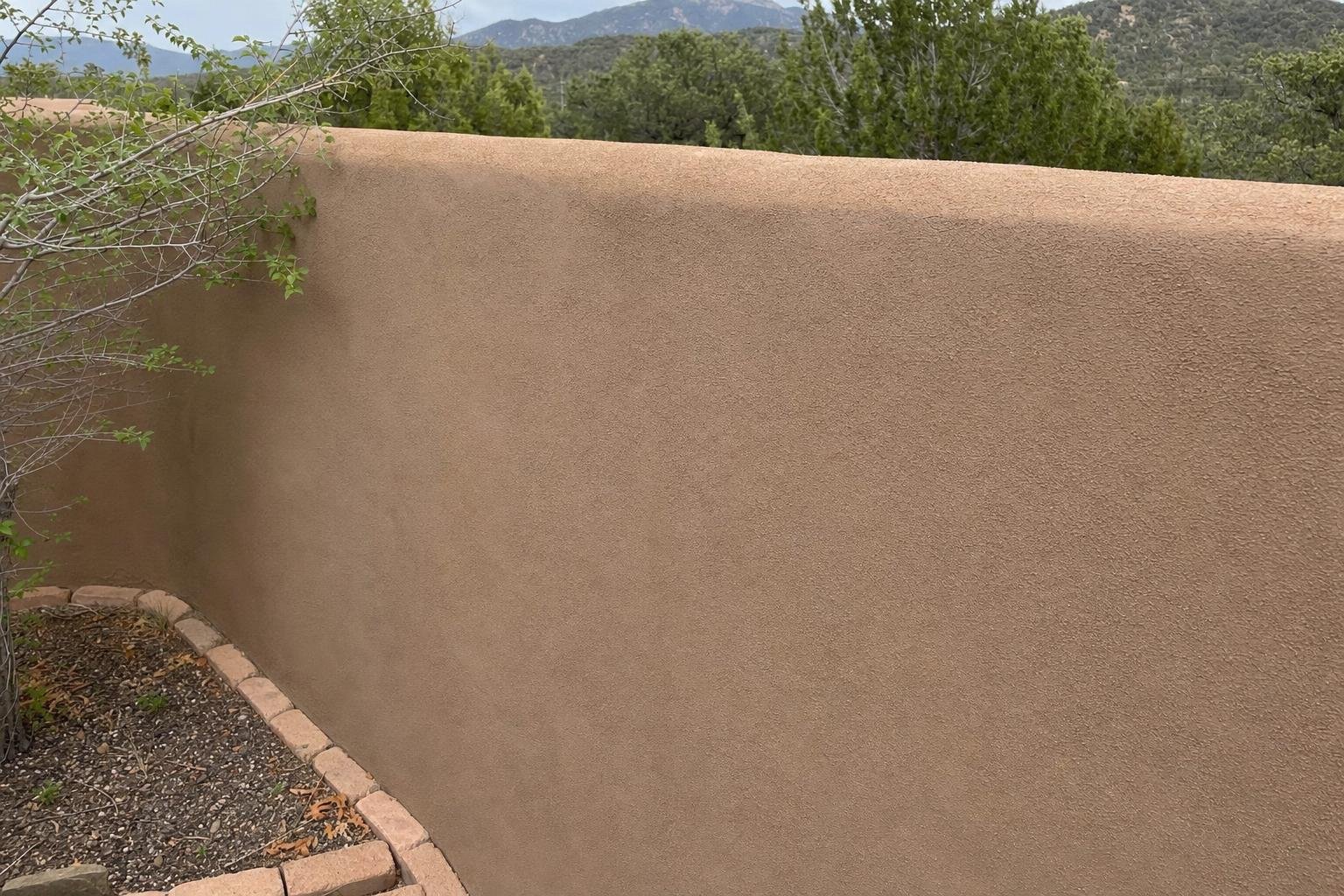 Stock photo of stucco delamination repair work